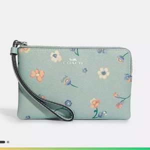 Blue floral pastel Coach wristlet